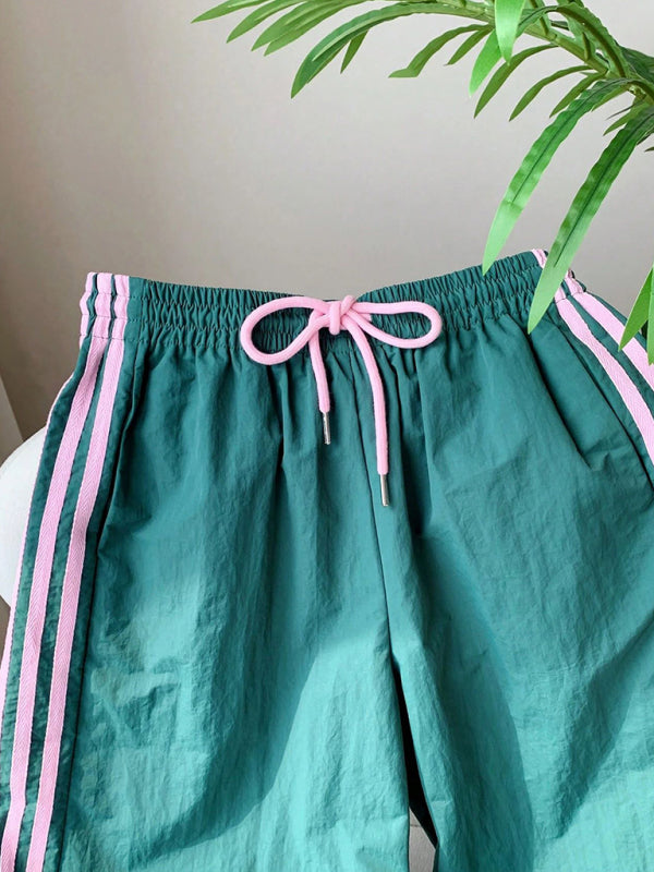 Side stripe elastic waist casual trousers